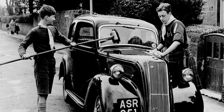 Scouts Ian Findlay (left) and Angus Rouse hard at work during Bob A Job Week in Dundee in 1951.
