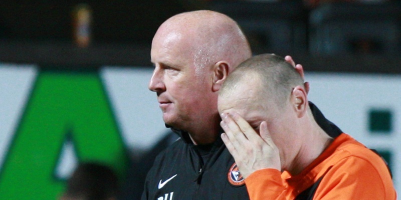 Kris Miller, Courier, 25/10/11. Dundee Utd V Falkirk, League Cup. Dejected Flood is consoled by manager Peter Houston.