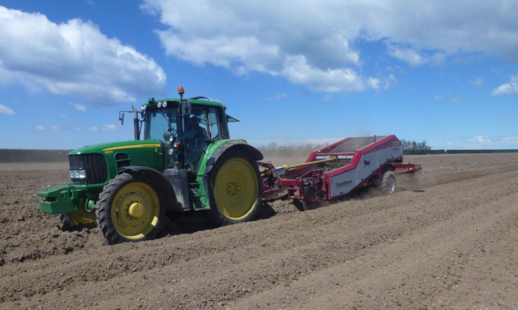 The Scanstone stone and clod separator hard at work on Canterbury Plains.