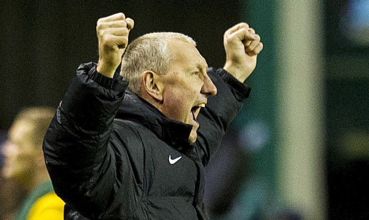 Terry Butcher celebrates victory over Hibs' capital rivals.