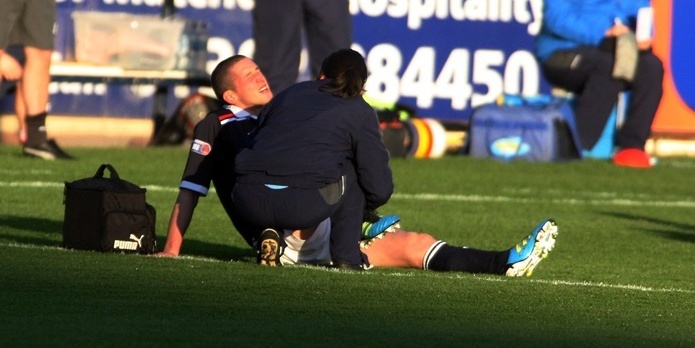 Gareth Jennings,Sunday Post....Dundee v Raith , new signing callum elliot is taken off injured after 2 minutes