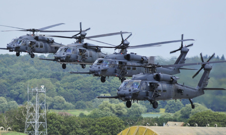 A library photo of four 56th Rescue Squadron HH-60G Pave Hawks at RAF Lakenheath.