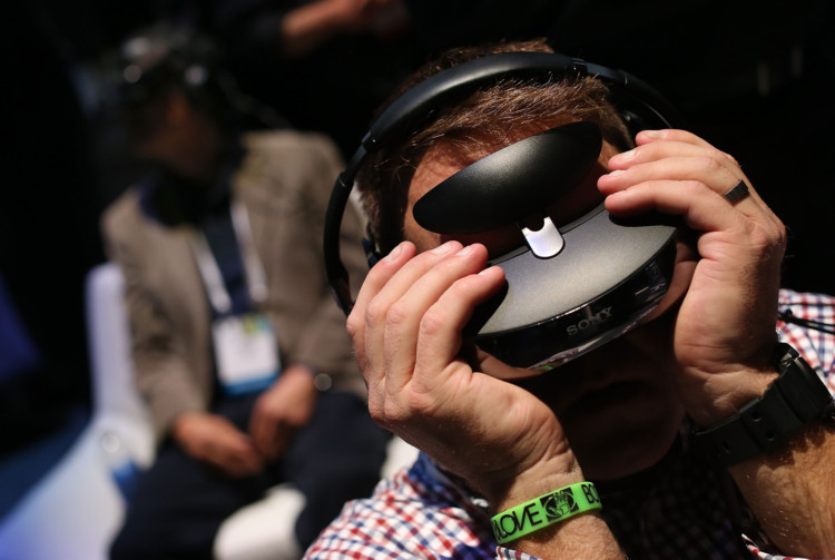 Attendees wearing video gaming goggles in the Sony booth at CES 2014. The worlds top technology companies have been giving an insight into the gadgets of the future at the 2014 Consumer Electronics Show in Las Vegas. More than 3,200 exhibitors are at the the largest show floor in history. The first CES was held in 1967 and it has become famous for its early previews of technology that has gone on to shape our lives  or disappear into obscurity.