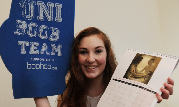 Emily Lucas with some of the Dundee Uni Boob Teams promotional material.