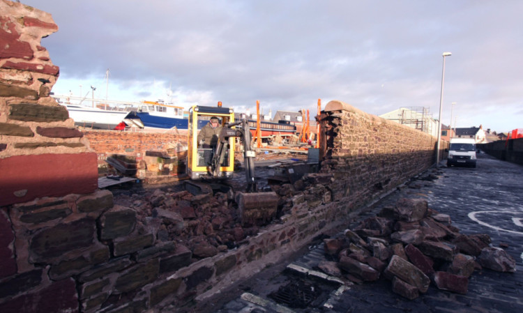 Damage to a wall at Arbroath Harbour.