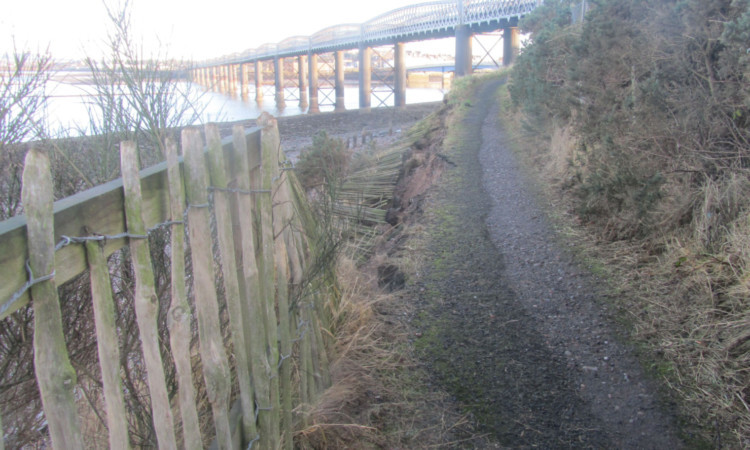 The path that has been closed due to coastal erosion.