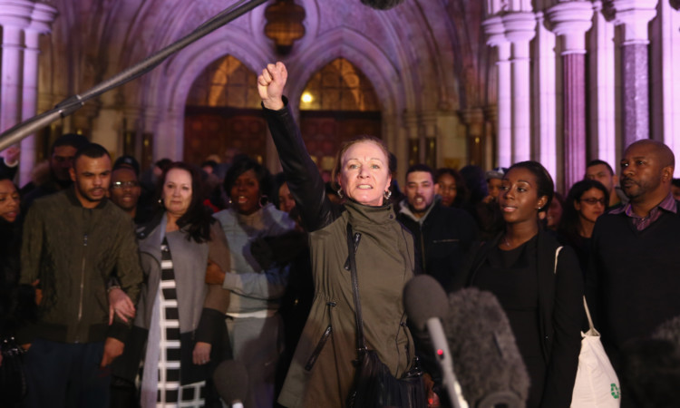 Carol Duggan, aunt of Mark Duggan, speaks to reporters outside The Royal Courts of Justice.