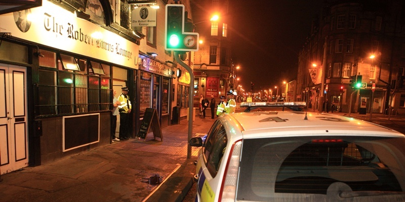 Police in County Place Perth Sunday
Pic Phil Hannah