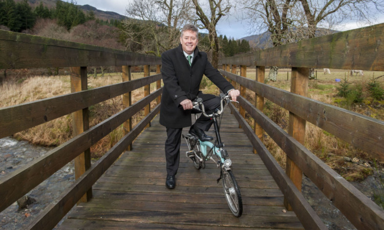 Transport Minister Keith Brown on part of the new cycle route.