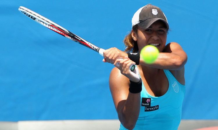 Heather Watson of Great Britain plays a backhand in her 6-4 6-3 Australian Open qualifying victory over Arina Rodionova of Australia.