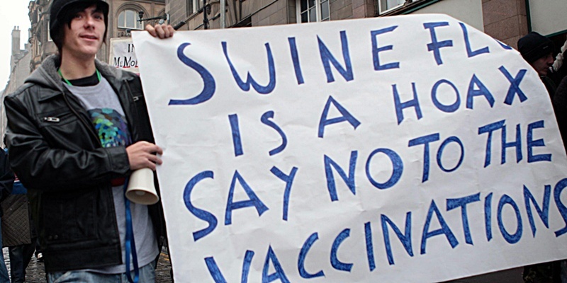 Protesters march to the Scottish  Parliament in an "anti-swine flu vaccination protest" along the Royal Mile Edinburgh.