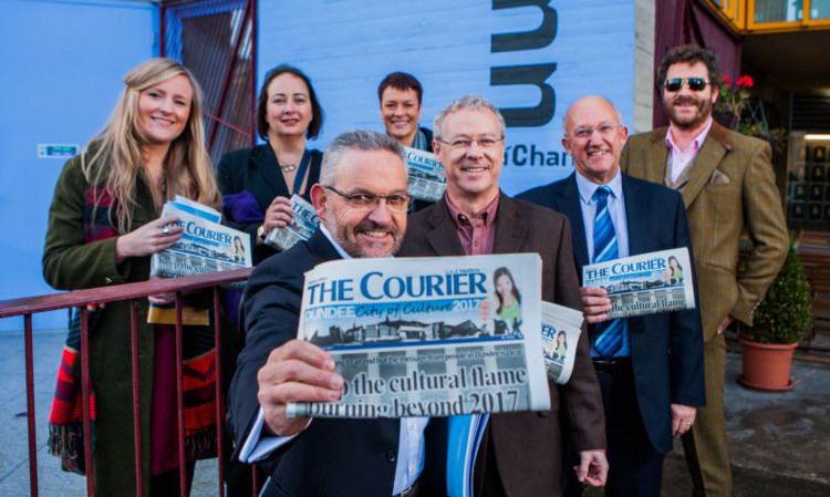 Dundee's City of Culture 2017 bid team - Clare Brennan, adviser Anna Day and Janet Archer. Front: Stewart Murdoch, Bryan Beattie, David Dorward and Chris van der Kuyl - all holding copies of The Courier newspaper, with the front page headline 'Keep the cultural flame burning beyond 2017'.