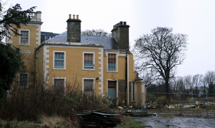 The partially demolished property.