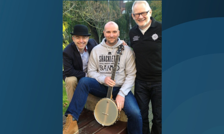 Stewart with an earlier Islander Ash Leaf banjo model, together with GBBC managing director Simon Middleton, right, and company chairman Nigel Cushion.