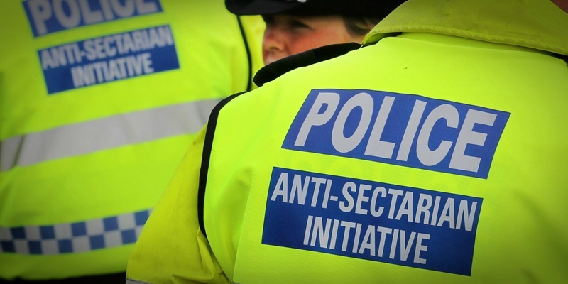 Previously unreleased photo dated 18/09/11 of police wearing Anti-Sectarian Initiative jackets at the Old Firm match between Glasgow Rangers and Glasgow Celtic at Ibrox, Glagow.