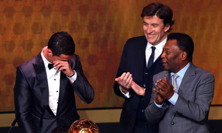 Cristiano Ronaldo breaks down after receiving his award from Pele.