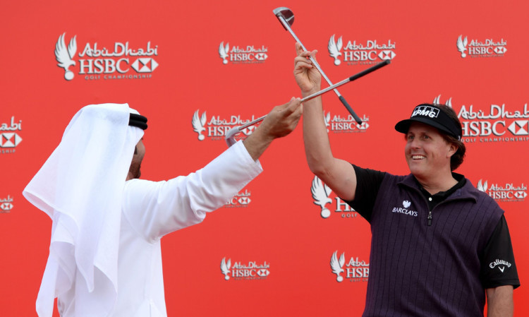 Phil Mickelson on stage with local dancers ahead of the Abu Dhabi HSBC Golf Championship.