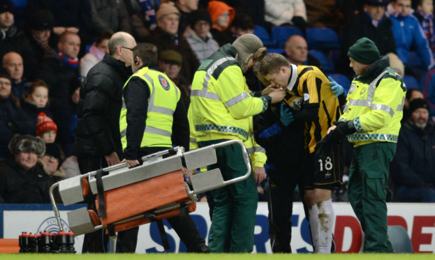 Pat Clarke dislocated his shoulder at Ibrox.