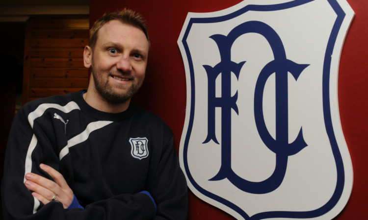 New Dundee signing Stephen Hughes is unveiled at Dens Park.