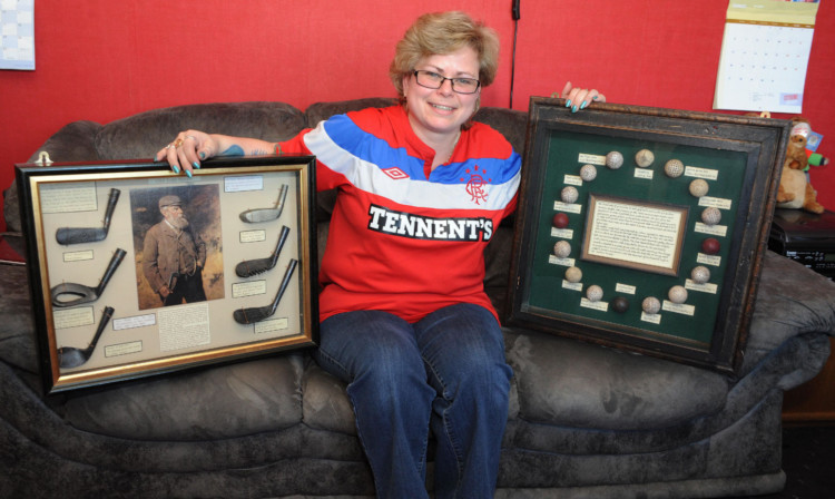 Kerrie Woods with the memorabilia.