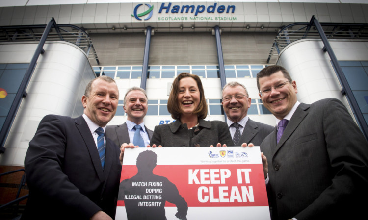 SFA Chief Executive Stewart Regan (left) joins PFA Scotland Chief Executive Fraser Wishart (2nd from left), Crimestoppers Commercial Manager Kate Johnston (centre), Coaches and Managers Association Chairman Alex Smith (2nd from right) and SPFL Chief Executive Neil Doncaster as they launch a new security and integrity hotline.