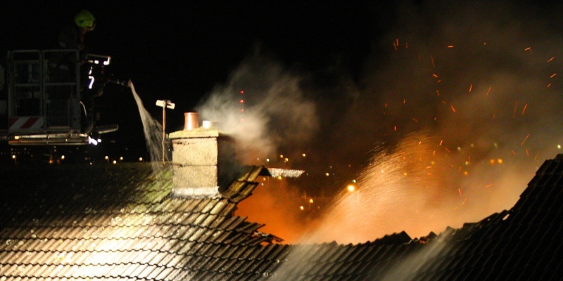 Kris Miller, Courier, 27/11/11. Picture today at Fire at 36 Balmossie Street, Dundee shows firefighters at the scene with sparks flying from the building.