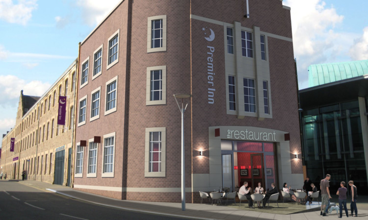 An artists impression of the completed hotel, alongside Perth Concert Hall.