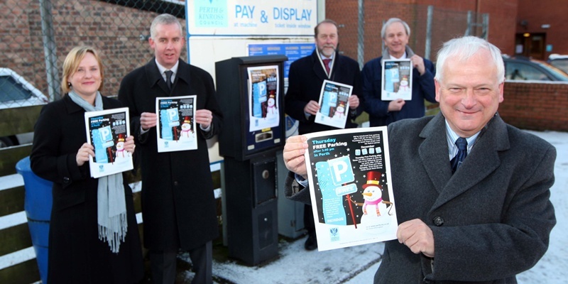 Steve MacDougall, Courier, Mill Street Car Park West, Mill Street, Perth. Announcement by council of free parking scheme in run-up to Christmas. Pictured, at the front is Councillor Ian Miller (Council Leader). At the back, left to right is Gillian Coyne (City Centre Manager), Jim Valentine (Depute Director for Environment), Ian Mutch (Operations Director for McEwans) and Ken Bowman (Deputy Centre Manager at St John's Shopping Centre).