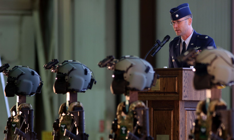 Lt Col Jared Herbert addresses a memorial service for killed USAF crew.