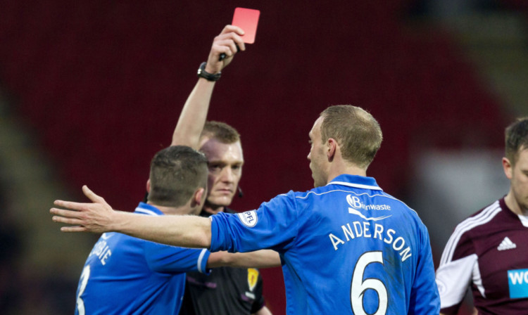 Brian Colvin shows Steven Anderson the red card.