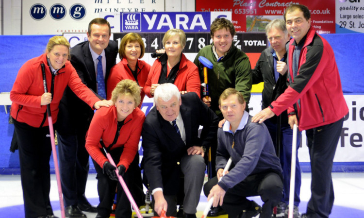 Alan Wood from sponsors Yara, throws the first stone, flanked by former ladies champion Gwen Prentice from Berwick- upon-Tweed and past Yara champion Ian Drysdale from Fife. Second from the left is Peter Smith, Yaras business manager Scotland.