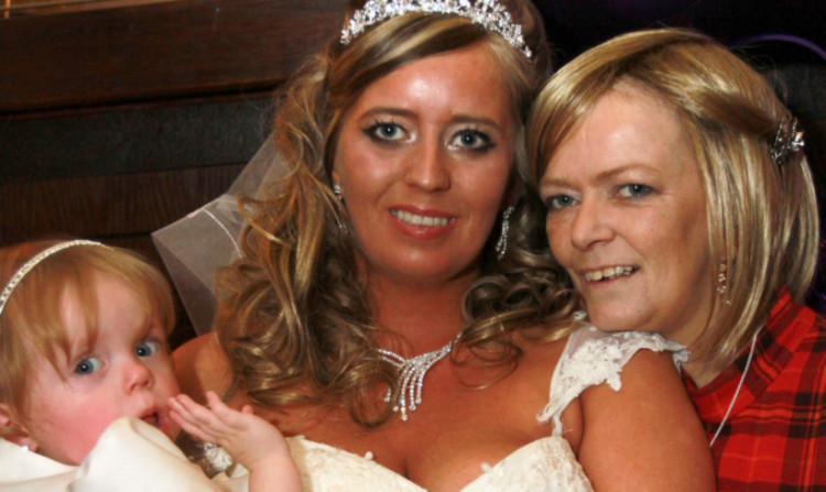 Michelle with daughter Cheryl and granddaughter Keira on the wedding day.