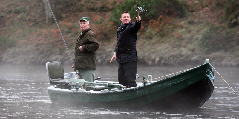 Steve MacDougall, Courier, Hilton Dunkeld House Hotel, Dunkeld. Opening of Tay salmon season by St Johnstone manager, Steve Lomas. Pictured, Steve Lomas (right) and Jim Ferrie (who runs the Dunkeld House Fishings) with the first cast.