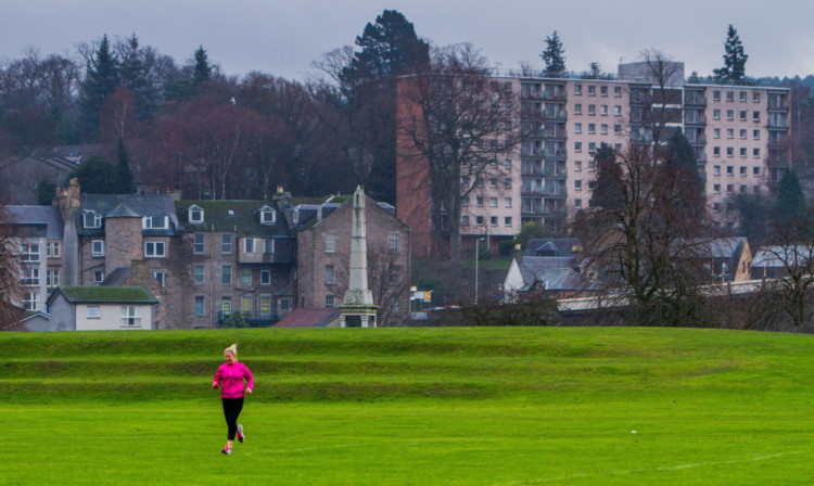 A jogger made good use of one of Perths greenspace areas  the North Inch.