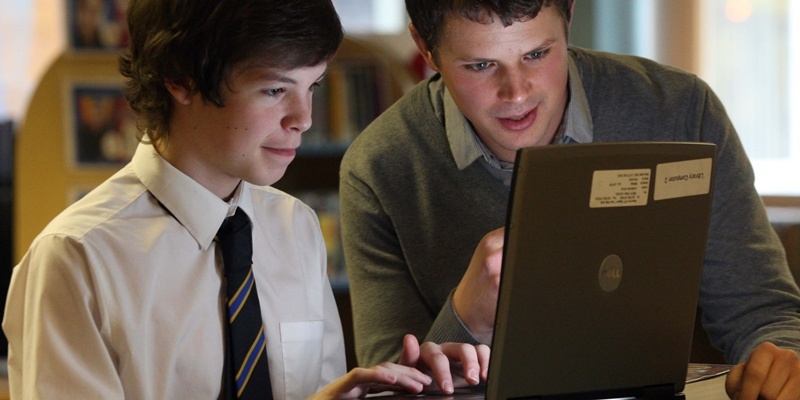 Perth High School, Oakbank, Perth. First Scottish students trained to beat "cyber bullying". Pictured, at the laptop is pupil Ethan Laing alongside Patrick Gifford (Programme Manager with Beatbullying).