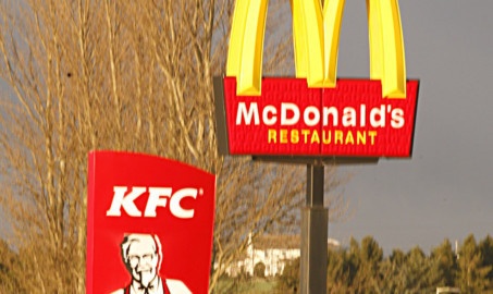 The KFC and McDonalds signs on the A90.