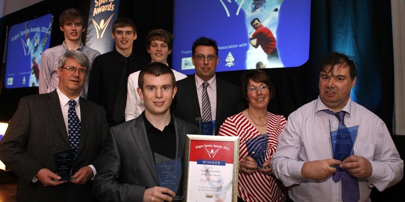 At the Angus SPorts Awards 2011 the winners are photographed with their awards: Back from left: Kevin Myers, Mark Myers and Nicky Sim, Team Award, Arbroath; Paul Boath, Coach of Year; Pat Sawers collecting award on behalf of the Young Sports Personality of year Ailsa Summers, Carnoustie; and Ian Bradford, Montrose; Sports Personality of Year for People with  a disability; Front: Neil Valentine, Forfar, Service to Sport; and Sports Personality of the Year Greg Drummond, Forfar.