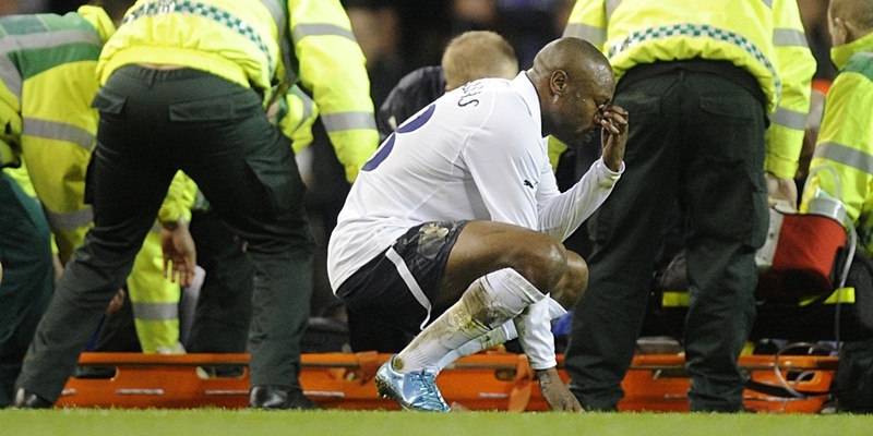 The medical team tend to Bolton Wanderers' Fabrice Muamba as Tottenham Hotspur's William Gallas reacts