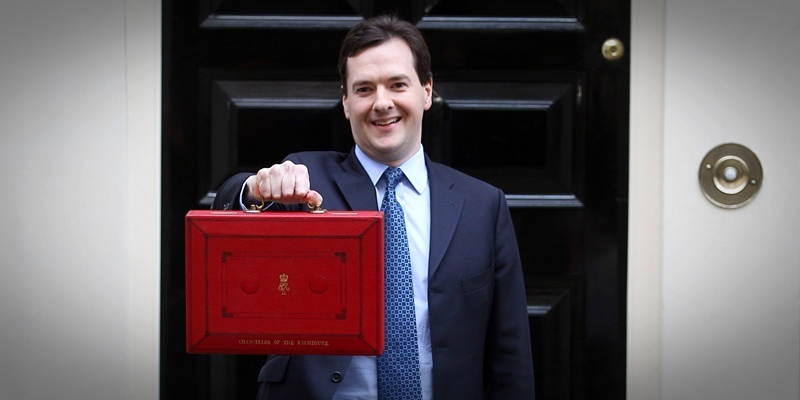 NOTE ALTERNATE CROP.
Chancellor of the Exchequer George Osborne holds up his red Ministerial Box outside 11 Downing Street before heading to the House of Commons to deliver his annual Budget statement.