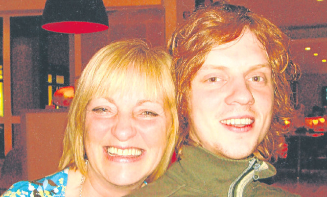 Sandra Ramsay with her son Ross who took his own life last year.