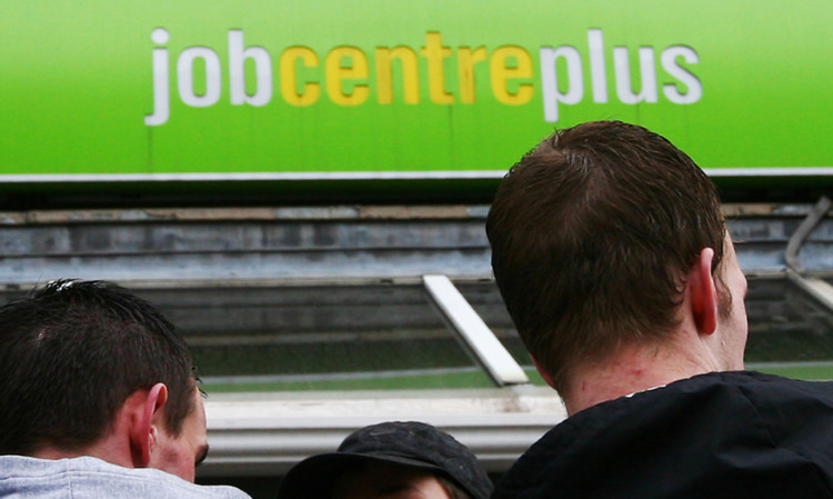 A group of men wait outside Chatham Job Centre Plus in Kent. Picture date: Thursday 19th March 2009. See PA story credit should read: Gareth Fuller/PA Wire ... Unemployment figures ... 19-03-2009 ... Chatham ... UK ... Photo credit should read: Gareth Fuller/PA Archive. Unique Reference No. 7023143 ...