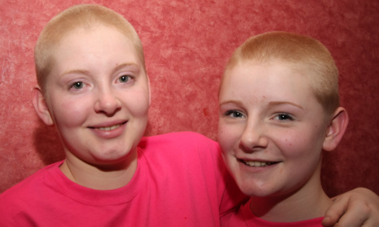 The girls after the fundraising cut.