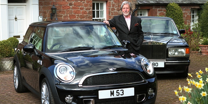 DOUGIE NICOLSON, COURIER, 16/04/12, NEWS.

Pictured at home in Bridge Of Earn today, Monday 16th April 2012, is Ian Imrie with his new Mini Goodwood beside his Rolls Royce. Story by Perth office.