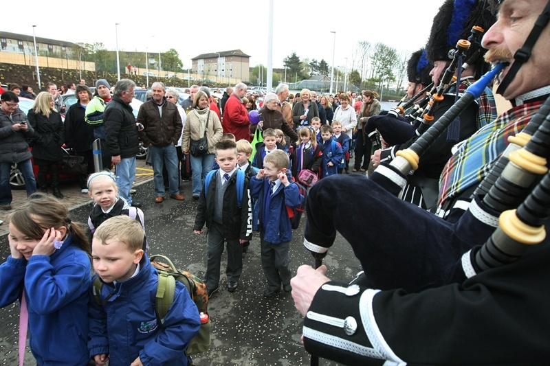 DOUGIE NICOLSON, COURIER, 18/04/12, NEWS.

The pupils are piped into the new Ballumbie Primary School, in Whitfield, Dundee today, Wednesday 18th April 2012, by the Mains Of Fintry Pipe Band.