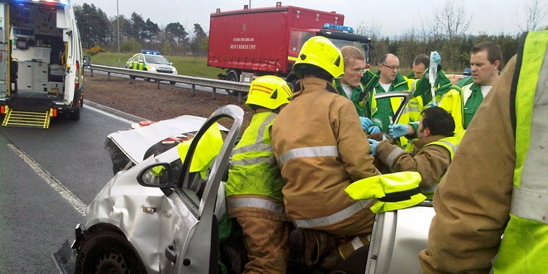 Submitted picture of Auchterarder A9 accident  words from Perth.

Note: The picture below shows a Firefighters and Paramedics stabilising the casualty prior to extrication.