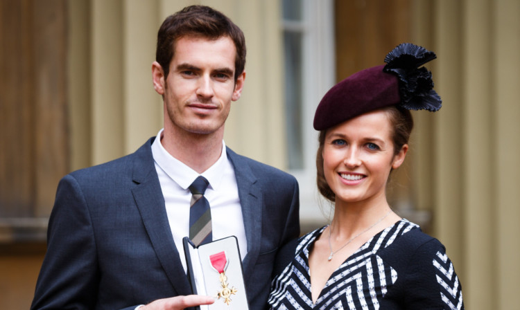 Andy Murray with Kim Sears after collecting his MBE in October.