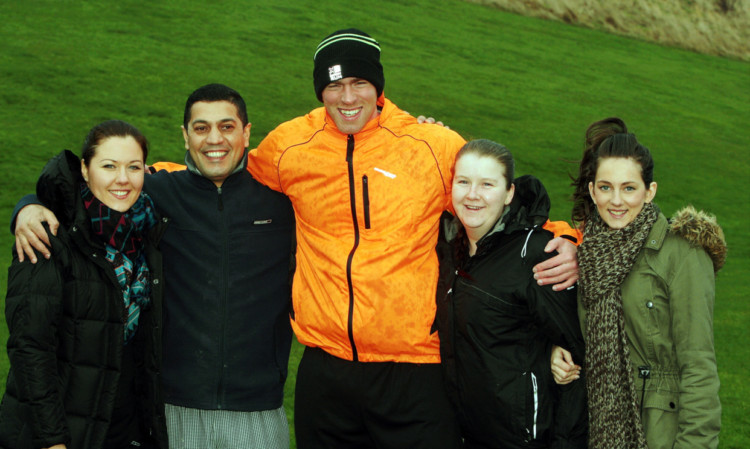 Andrew Muir, with staff from The Bell Rock Restaurant, which is one of his sponsors. From left: Rasa Pupiute, K Musa, Mr Muir, Natalie McCugh and Siobhon Reid.