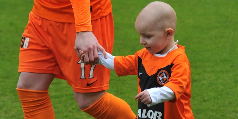 Kim Cessford - 06.05.12 - Clydesdale Bank Premier League match between Dundee United and Celtic at Tannadice - a young girl from Fife who is suffering from cancer enjoyed the treat of being one of the team mascots - Summer Wroniecki running out with Gary Mackay-Steven