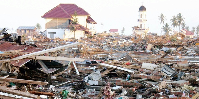 Corpses and debris in Banda Aceh, the capital of Aceh province, following the devastating earthquake-triggered tsunami.