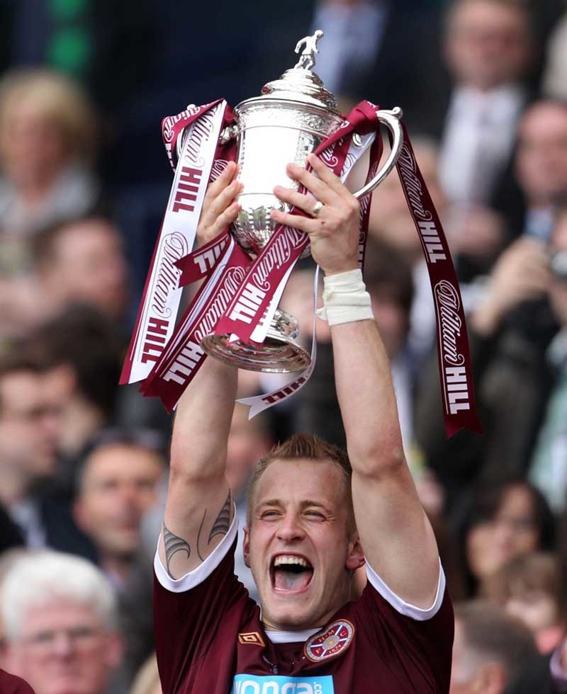 Heart of Midlothian's Danny Grainger celebrates winning during the William Hill Scottish Cup Final at Hampden Park, Glasgow.